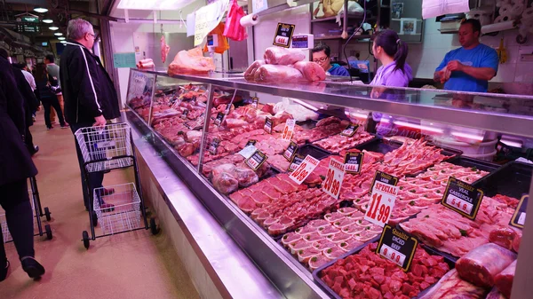 Shoppers at Queen Victoria Market in Melbourne, Australia