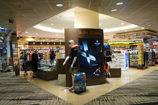 Customers shop for books in Singapore Airport