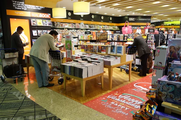 Customers looking for books in Changi Airport