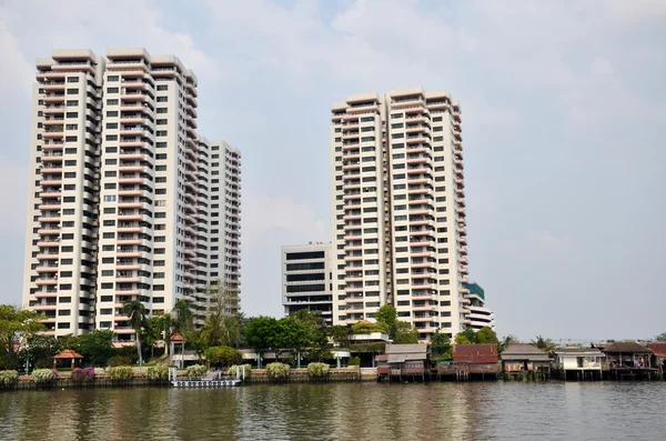 Luxury condominiom is built along the Chao Phraya river in Bangkok