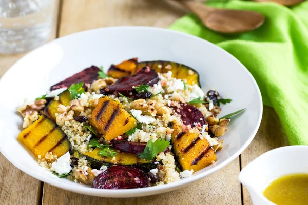 Quinoa with grilled pumpkin and beetroot salad