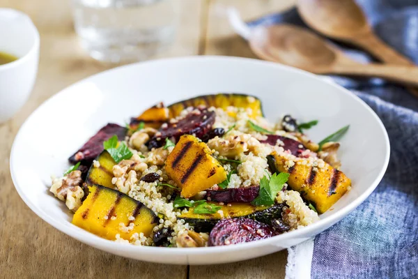 Quinoa with grilled pumpkin and beetroot salad