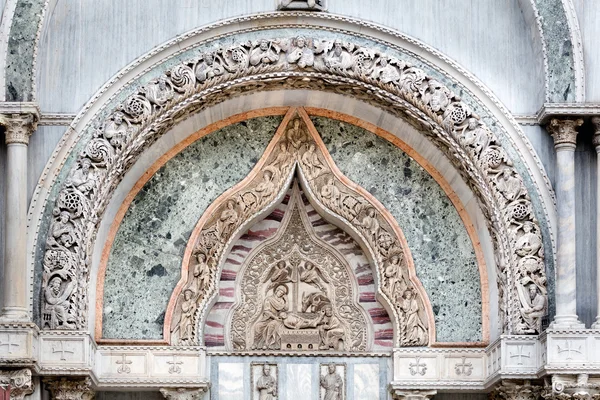 Medieval Venetian Gothic ornaments on the San Marco Basilica fac