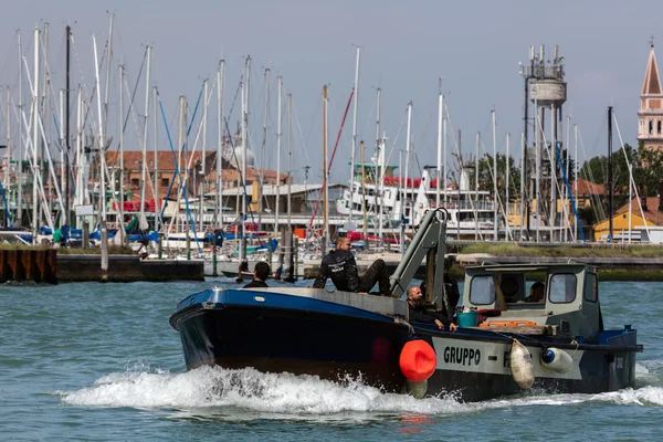 Repair boat in the Venetian lagoon