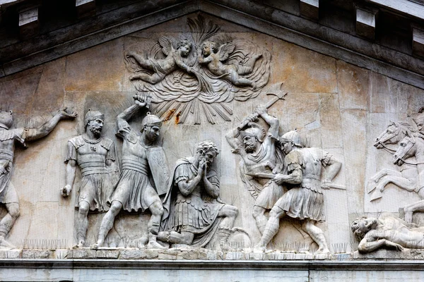 Bas-relief on the facade San Maurizio church in Venice, Italy