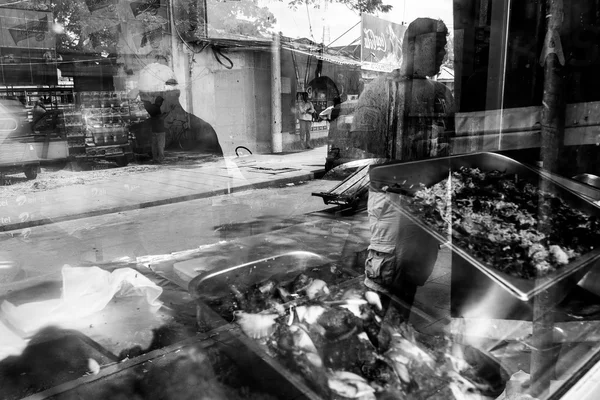 Colombo street market reflection