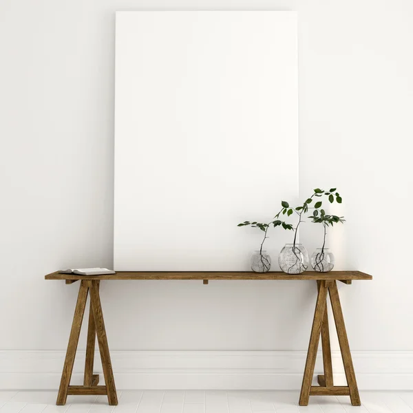 Mock up of a white canvas on a wooden table in a bright interior