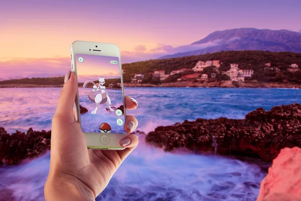 Iphone 5s white with pokemon go app