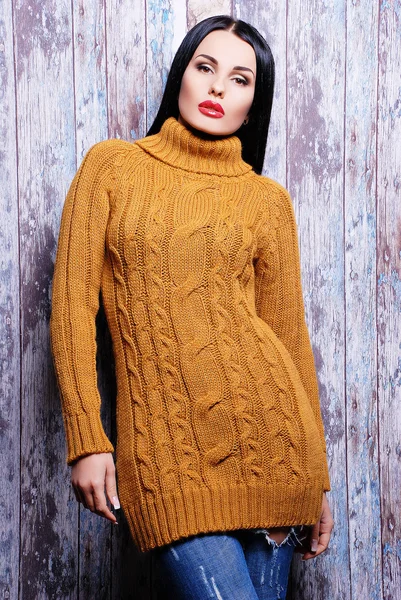 Woman in casual knitted sweater