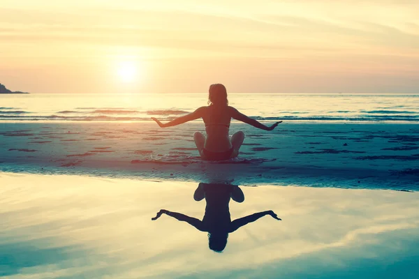 Female silhouette doing exercise