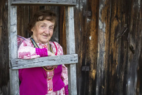Old woman in Slavic folk clothes