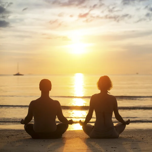 Young yoga couple