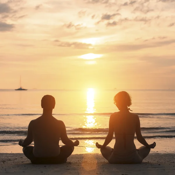 People practicing yoga