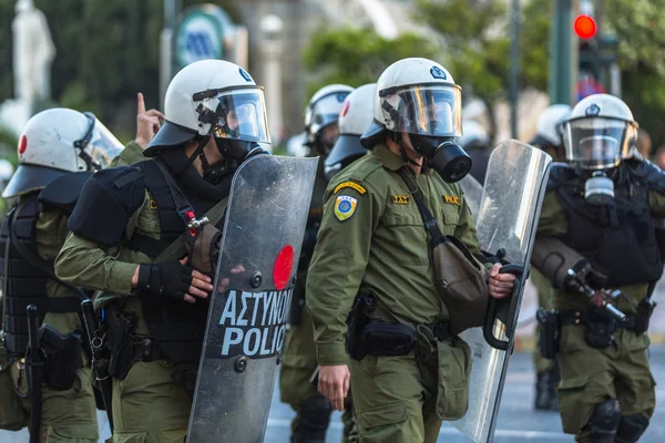 Riot police with their shields