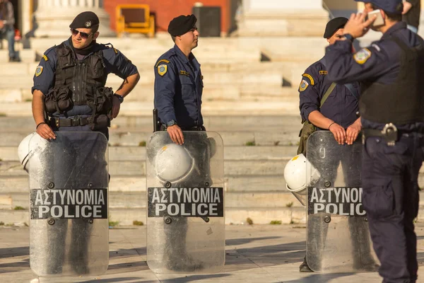 Riot police with their shields