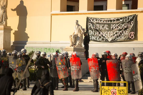 Riot police with their shields