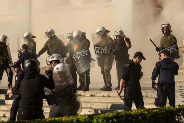 Riot police with their shields