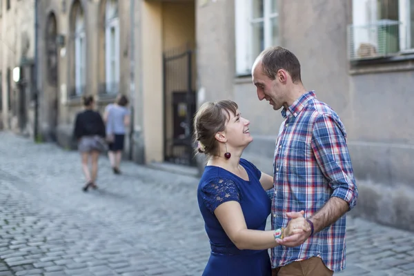 Couple in love dancing on pavement