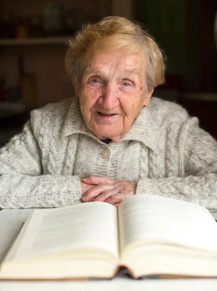 Portrait of Old woman reading  book