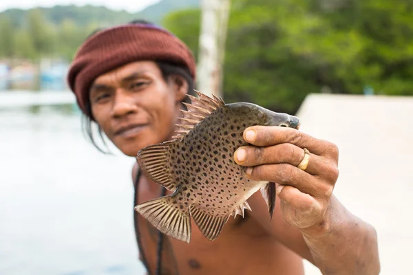 Unidentified local man in fisherman's village