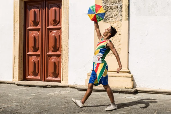 Brazilian man dancing Frevo in Olinda