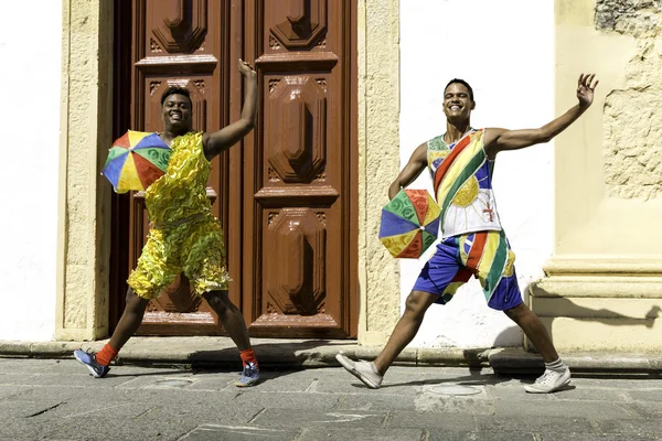 Brazilian men dancing Frevo in Olinda