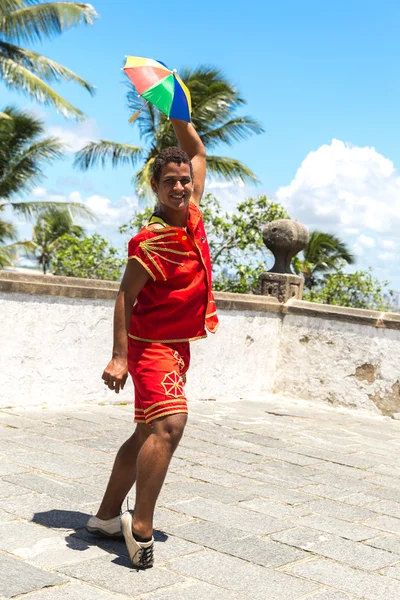 Brazilian man dancing Frevo in Olinda