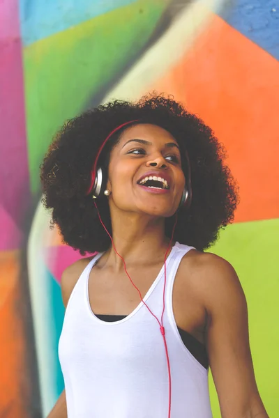 Woman listening music with headphones