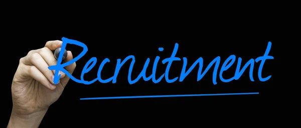 Recruitment hand writing with a blue mark on a transparent board