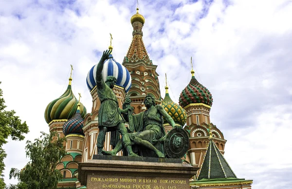Monument to Minin and Pozharsky on the Red Square in Moscow Russia. Saint Basil\'s Cathedral on the background.
