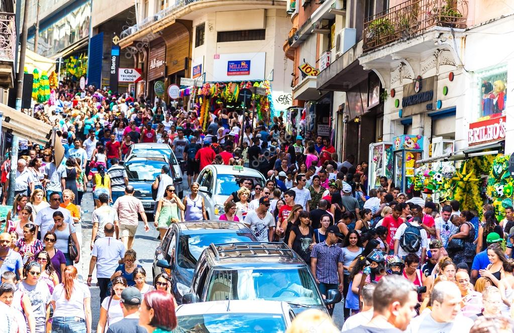 SAO PAULO, BRAZIL - CIRCA DEZ 2014: Hundreds of People walk along the