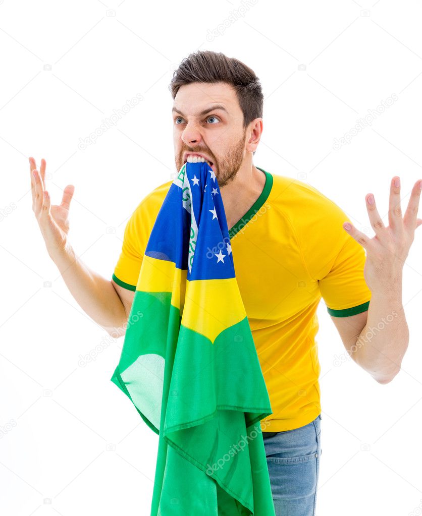 http://st2.depositphotos.com/1753052/6683/i/950/depositphotos_66834303-stock-photo-man-biting-the-brazilian-flag.jpg