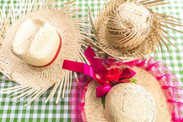 Brazilian traditional Straw Hats on the table (Festa Junina Theme)