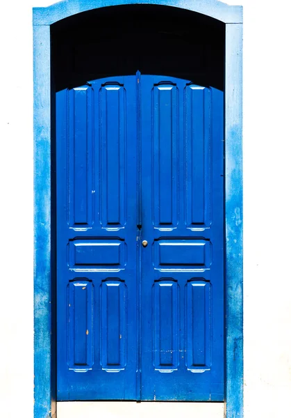 Antique blue door on the city of Ouro Preto, Minas Gerais, Brazil