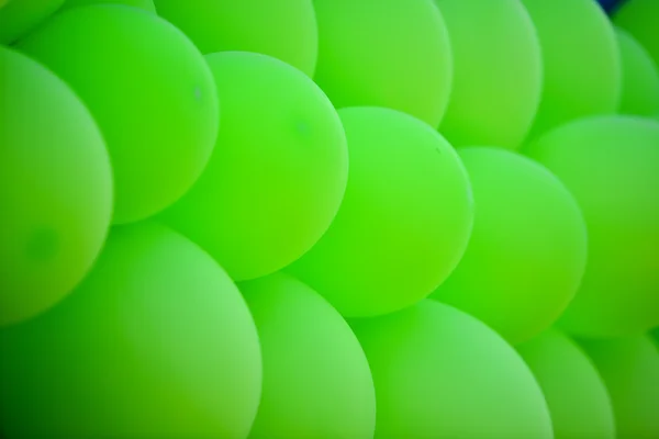 Green balloons background