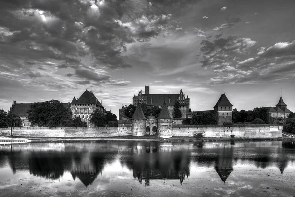 Teutonic Knights in Malbork castle in summer. World Heritage List UNESCO.