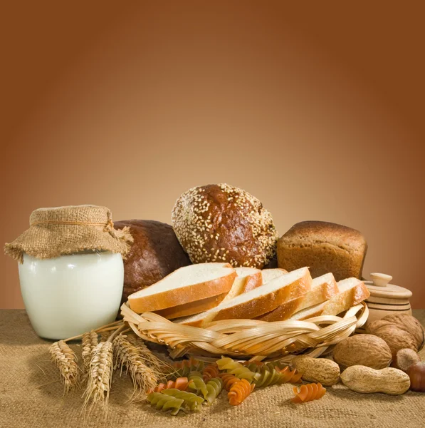 Mage of bread, nuts, wheat and dairy closeup