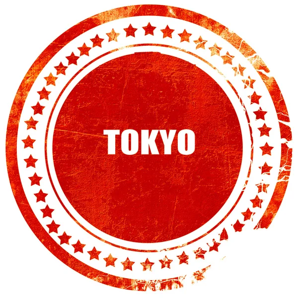 Tokyo, grunge red rubber stamp on a solid white background