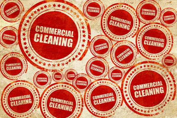 Commercial cleaning, red stamp on a grunge paper texture