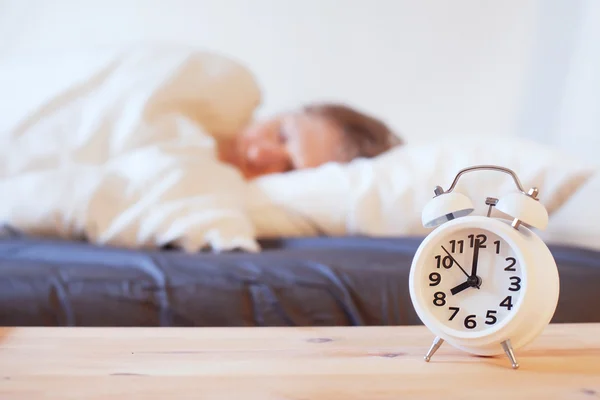 Person sleeping in the bed