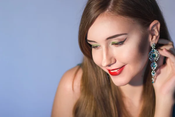 Elegant Posh Woman with Diamond Earrings