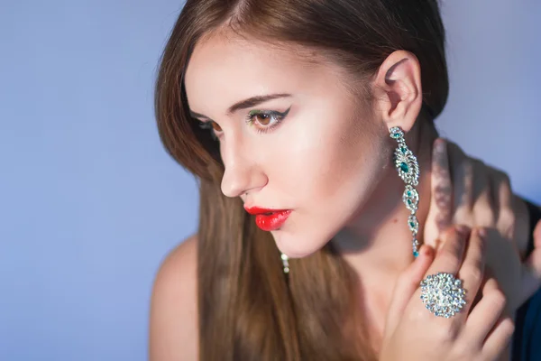 Elegant Posh Woman with Diamond Earrings