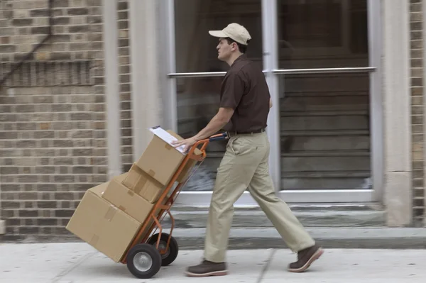Delivery man with boxes