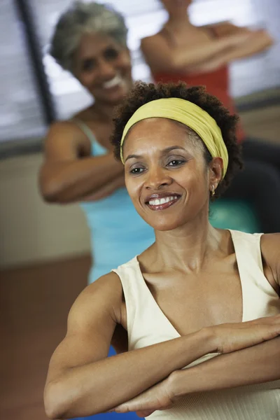 Multi-ethnic women in exercise class