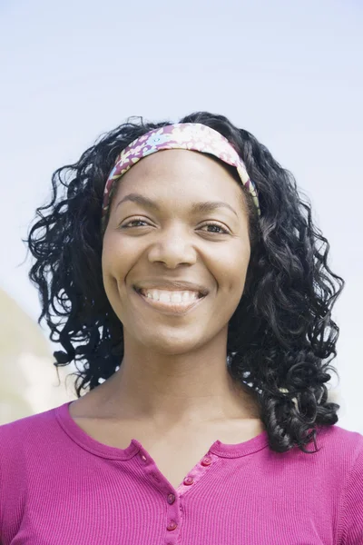 African woman wearing headband