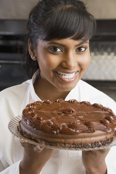 Mixed Race female pastry chef