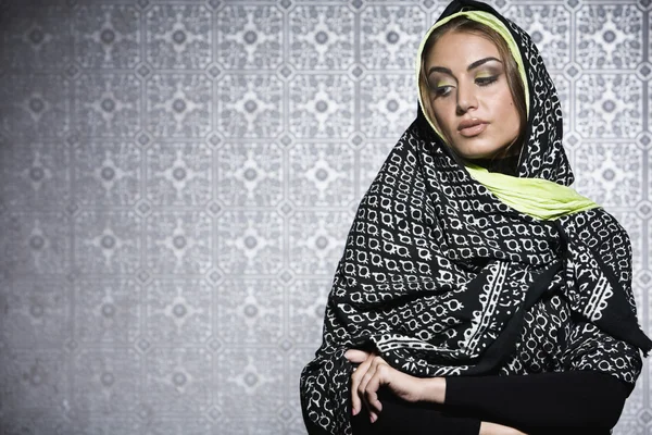 Middle Eastern woman wearing head scarf
