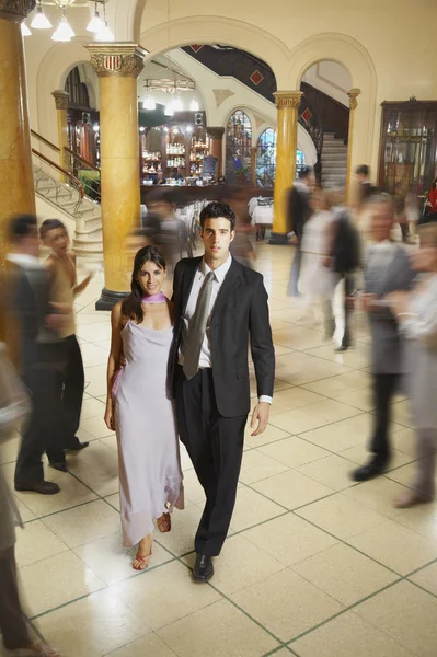 Young Hispanic couple in evening wear