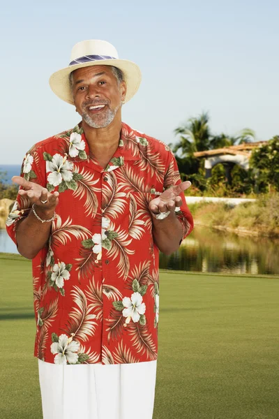 African man wearing Hawaiian shirt