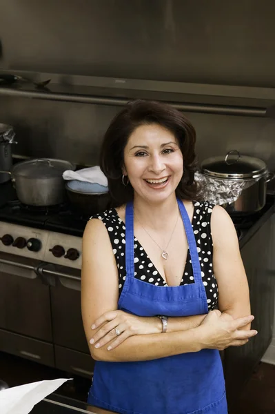 Hispanic woman in commercial kitchen